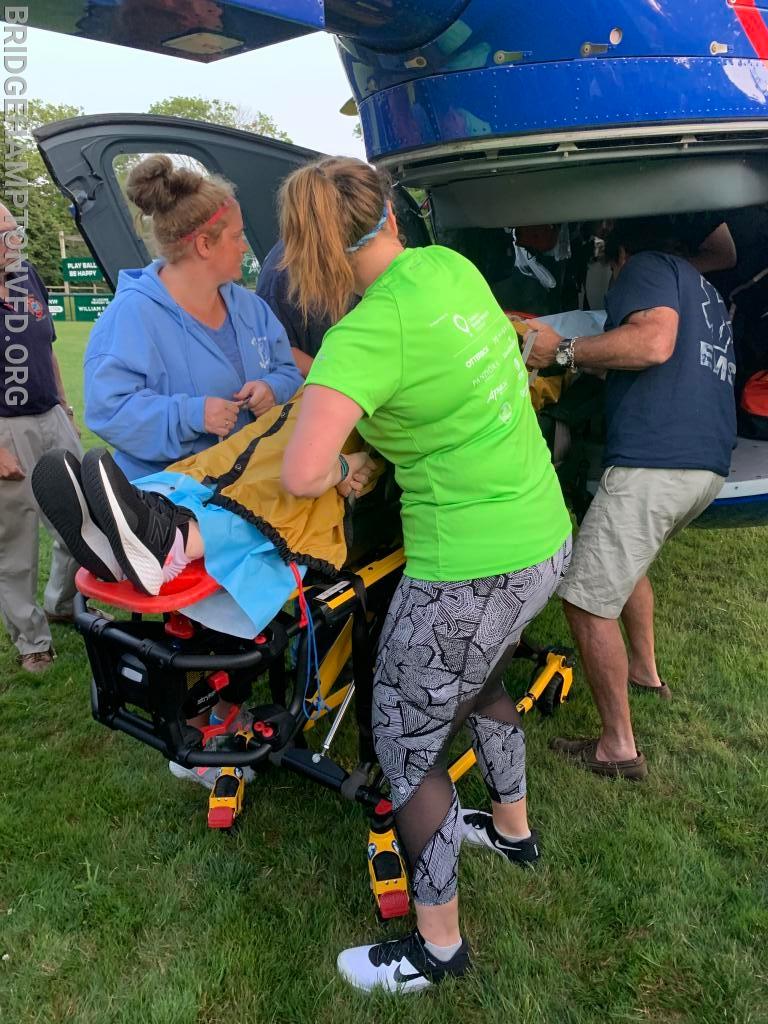 Loading our "patient" onto the Medevac.  